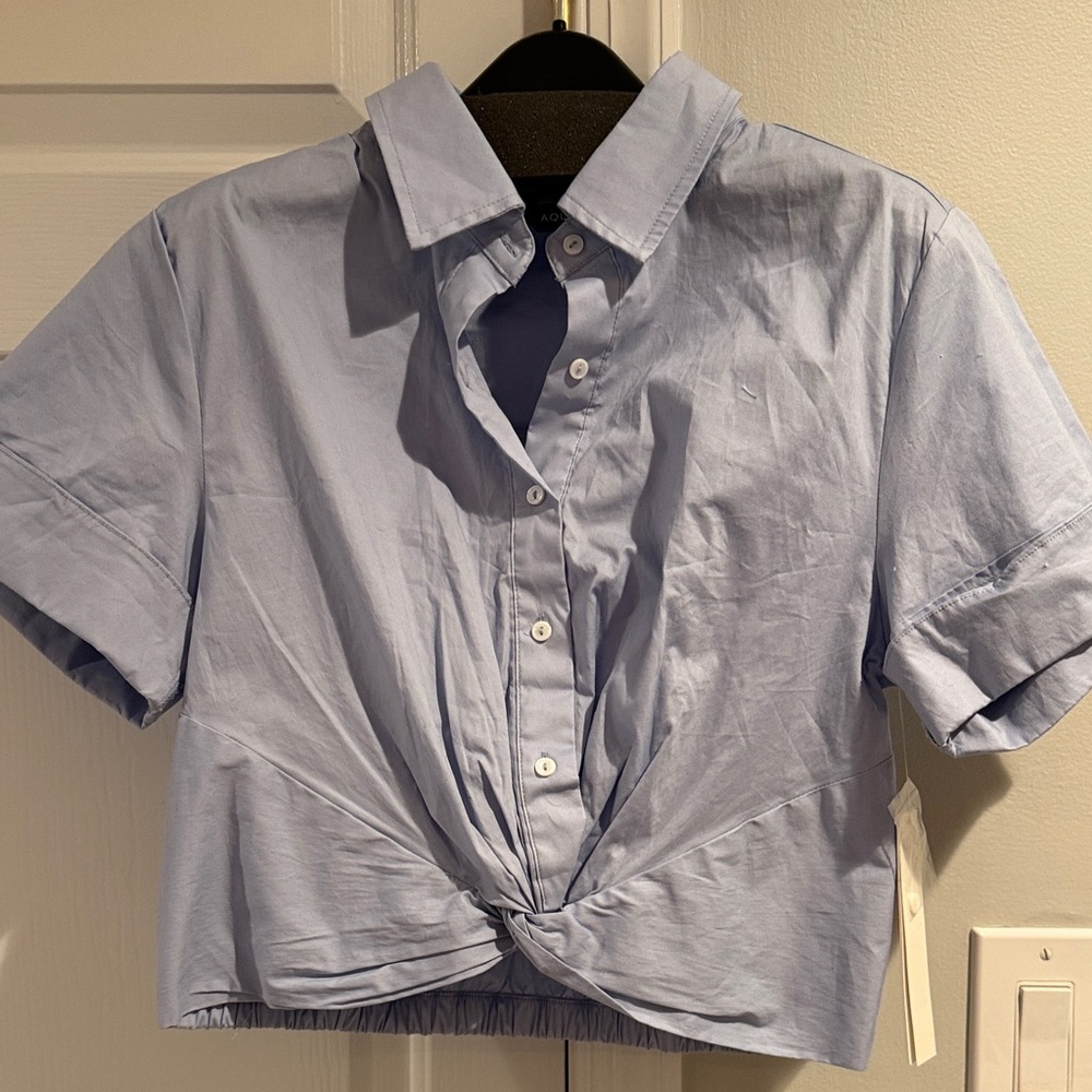 New with Tags. Aqua Blue Cropped Button-Up Shirt with Twist Front. Size Small.
